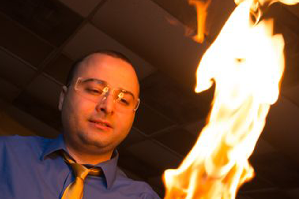 Professor works with fire